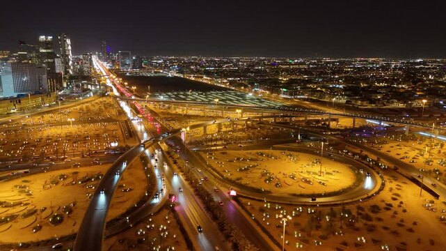Nighttime Aerial View of Riyad City Lights and Highways. KAFD