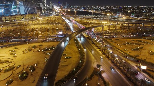 Nighttime Aerial View of Riyad City Lights and Highways. KAFD