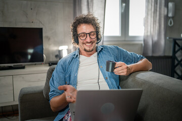 One man caucasian male freelancer work from home on laptop computer