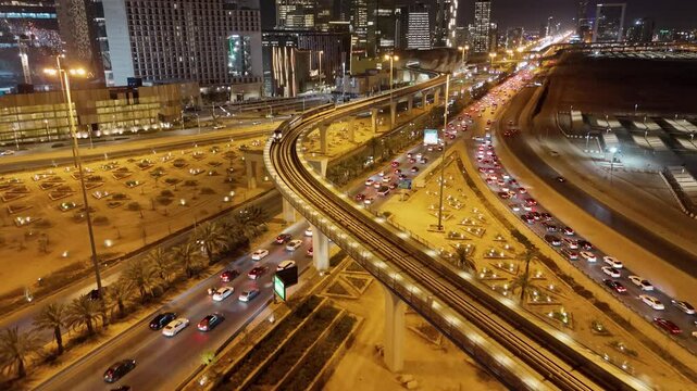 Nighttime Aerial View of Riyad City Lights and Highways. KAFD