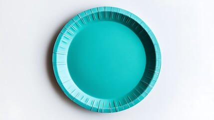 Teal paper plate on a pristine white background, top view photography.