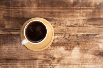 cup  coffee on a wooden background