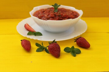 Gazpacho is a classic Spanish tomato soup flavored with mint, garlic, spices, and herbs. A must-try!