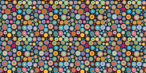 Colorful circular patterns on black background with concentric designs