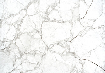 Fototapeta premium Clean and luxurious white marble texture featuring subtle natural veining, exuding elegance and simplicity. Smooth, bright surface makes it ideal for minimalist and sophisticated designs.