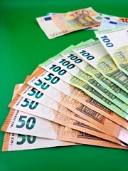 Euro money on green background. Finances of every European.
