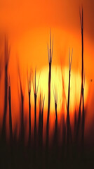 Naklejka premium The sun sets behind the wheat field, creating an orange and yellow color scheme 