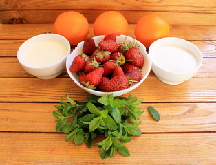 Summer Sweet Strawberry Soup with Cream and Orange Juice
A delicious light summer dessert made from orange, strawberries and cream with mint leaves