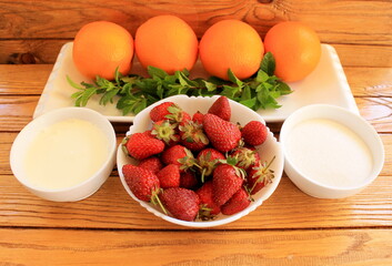 Summer Sweet Strawberry Soup with Cream and Orange Juice
A delicious light summer dessert made from orange, strawberries and cream with mint leaves
