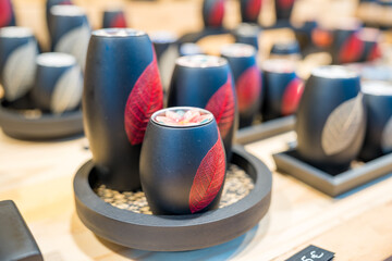 Elegant pottery collection showcasing intricate leaf designs on display