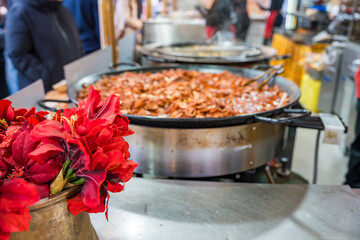 Sizzling flavors and vibrant colors at a festive culinary market gathering