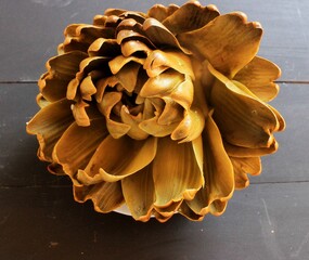 Artichoke cooking artichoke fruit with sauce and herbs. Ripe artichoke for a seasonal dish cooked whole Mediterranean cuisine