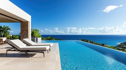 Fototapeta na wymiar A beautiful pool with two lounge chairs on the edge of it