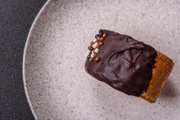 Round sweet New York roll croissant with chocolate cream filling