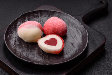 Delicious sweet mochi in the shape of red hearts
