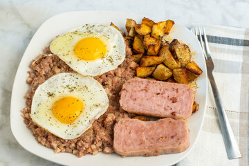fried eggs with spam and hash browns