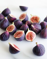 Close-Up of Fresh Figs Halved and Whole on White Background – Juicy Purple Fruits for Gourmet Recipes, Clean Eating, and Natural Wellness Concepts