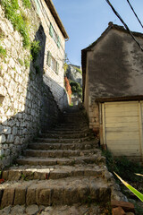  Scenic road to the fortress on the mountain in the ancient town of Kotor Montenegro. High quality photo