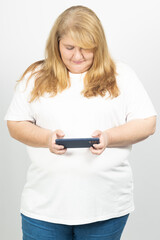 Fototapeta premium Blonde Plus Size Woman Using Smartphone Horizontally