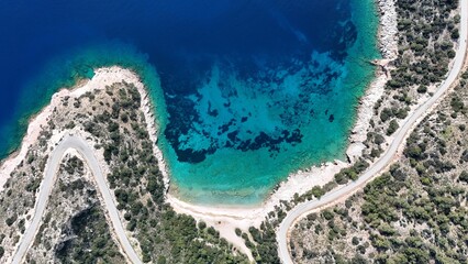 Aerial view of Kurubük Bay, a stunning hidden cove on the Mediterranean coast of Turkey. The...
