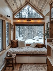 Cozy reading nook features a beautiful winter forest view
