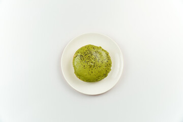 Matcha Glazed Donut on White Plate