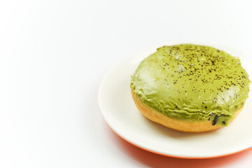 Matcha Glazed Donut on White Plate