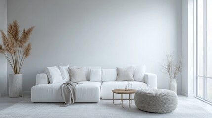 A stylish white-themed living room with elegant minimalist decor and cozy vibes.