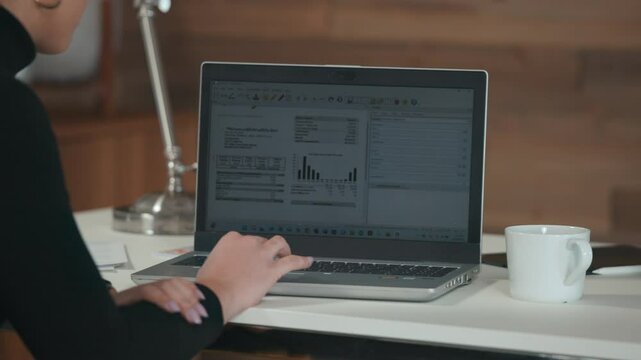 Document management, invoice processing, woman scrolls desktop