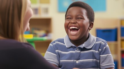 Happy autistic boy during therapy session with school counselor, supportive learning environment