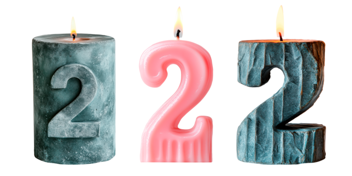 Set of number 2 candles in various styles, isolated on a transparent background. Includes a marble-textured cylindrical candle, a glossy pink numeral candle, and a stone-textured numeral candle.