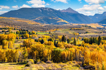 Fall Foliage in Lake Creek valley, near Edwards, Colorado, with view towards Gold Dust Peak and New York Mountain.