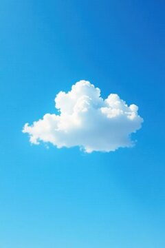 A lone white cloud floats serenely against the brilliant blue background of a sunny sky, cloud, cloud, peaceful