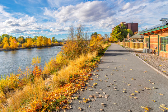 View from the Riverfront Trail walking path along the Clark Fork River at Caras Park of the University District in downtown Missoula, Montana.	