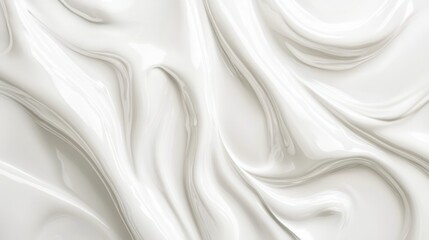 Obraz premium An abstract image featuring smooth, flowing white textures resembling fluid or cream. The smoothness creates a serene, modern aesthetic.