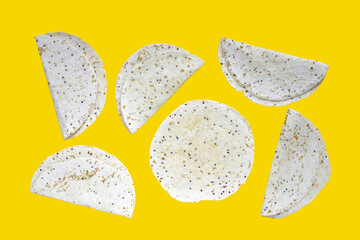 Quinoa tortilla wraps on yellow background