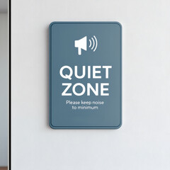 A sleek, rectangular Quiet Zone sign with rounded corners, featuring a calming blue-grey background, white text, and no noise icon. Perfect for modern offices promoting calm and productivity.