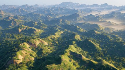 Fototapeta premium Aerial View of Serene Green Rolling Hills and Mountainous Landscape Under Soft Morning Light