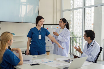 Nurse and physician collaborating on patient care in a clinical setting.