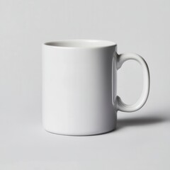 Obraz premium Plain White Ceramic Mug on Light Gray Background