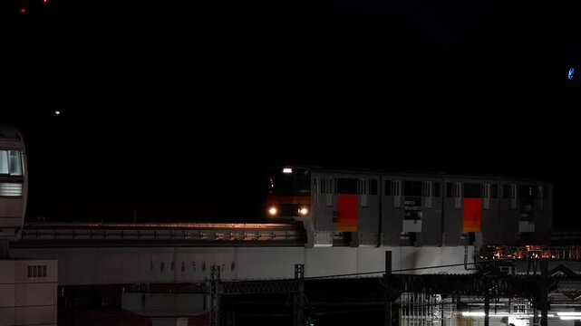 Tokyo,Japan - February 15, 2025: Arrival of a monorail To Tama Center Station in Tokyo, Japan

