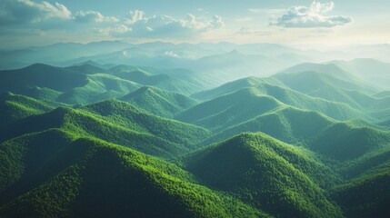 Lush Green Mountain Range Surrounded by Misty Sky and Scenic Horizon with Soft Sunlight Illuminating Nature's Majesty