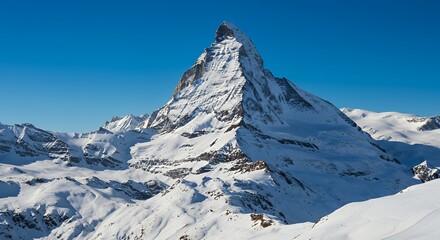 Snowy Matterhorn Mountain Peak Under Bright Blue Sky in Switzerland