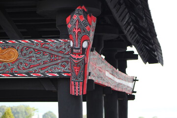 batak toba traditional house with gorga carving ornament