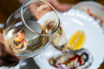 white wine at the raw oyster cuisine