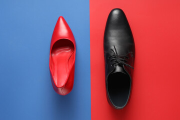 Female high heel and male shoe on color background