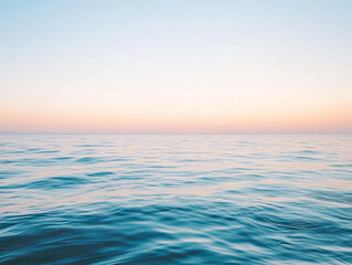 Obraz premium Tranquil ocean at sunset, peaceful horizon -ai