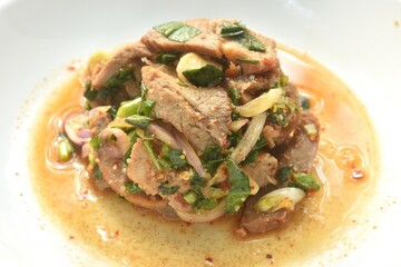 slice boiled pork with chop shallot and chili Thai salad taste spicy and sour on plate