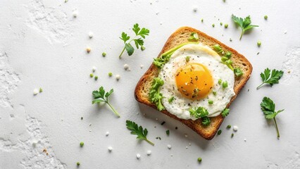A perfectly fried egg sunny-side up on whole-wheat toast, garnished with fresh herbs and spices, sits on a textured white surface