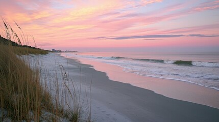 Serene Coastal Sunset Over Tranquil Shoreline with Gentle Waves
